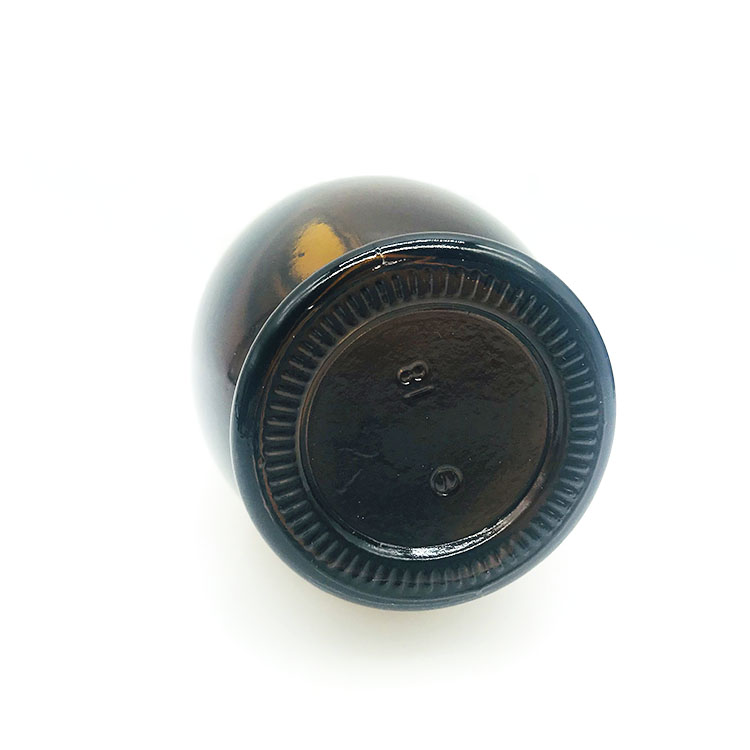 amber color essential oil bottle with cap