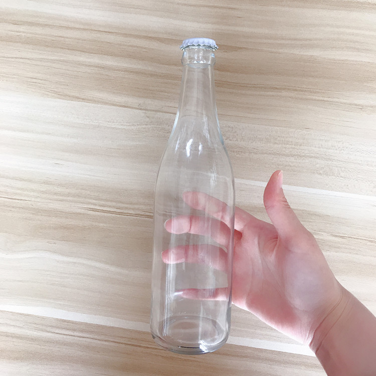 wholesale 330ml 500ml clear glass beer bottle with crown cap