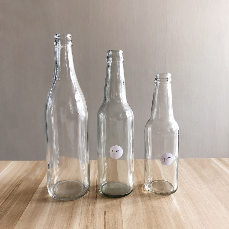 wholesale 250ml 330ml 500ml clear glass drinking bottle for beer with crown cap