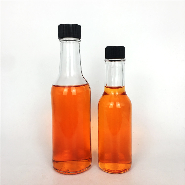 Hot sale 150ml 250ml clear glass sauce bottle with cap