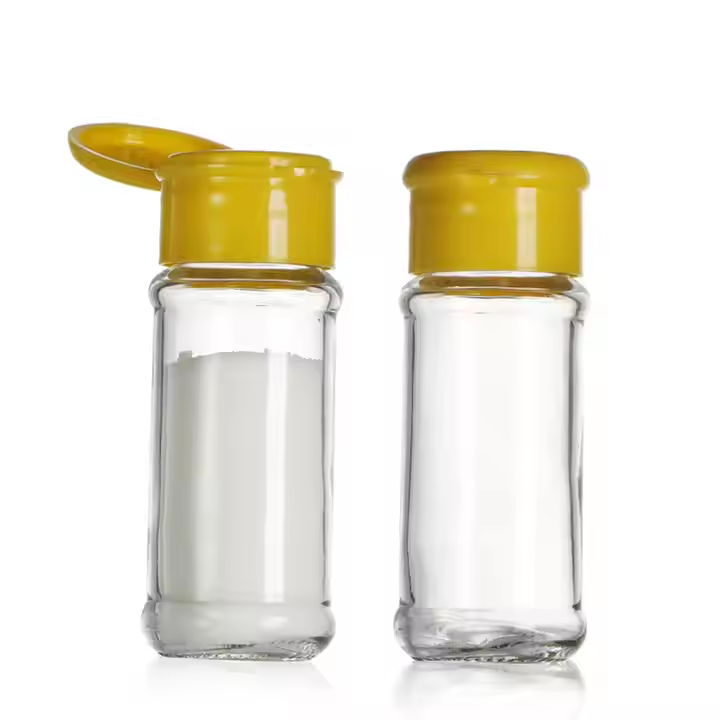 Factory Price Empty clear 70ml Glass Spice Bottle Round Glass Bottle with Flap Lid for Salt Pepper