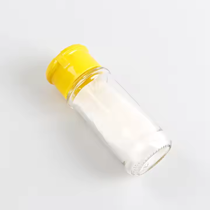 Factory Price Empty clear 70ml Glass Spice Bottle Round Glass Bottle with Flap Lid for Salt Pepper