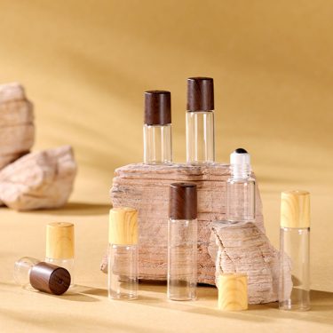 Wholesale Wood Grain Cover 1ml 2ml 3ml 5ml Mini Transparent Roller Ball Glass Bottle for Essential Oil Perfume Packaging