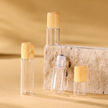 Wholesale Wood Grain Cover 1ml 2ml 3ml 5ml Mini Transparent Roller Ball Glass Bottle for Essential Oil Perfume Packaging