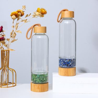 Manufacturers Supply 500ml Natural Crystal Gravel Energy Glass Water Bottle Glass Drinkware with Bamboo Lid and Handle Rope