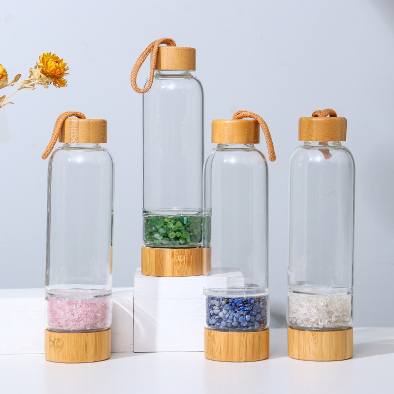 Manufacturers Supply 500ml Natural Crystal Gravel Energy Glass Water Bottle Glass Drinkware with Bamboo Lid and Handle Rope