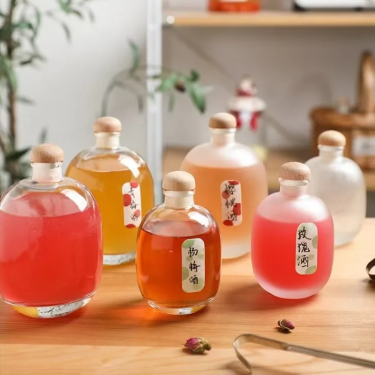 Wholesale 100ml 250ml 500ml Round Big Belly Transparent Custom Frosted Fruit Wine Glass Bottle with Cork Stopper
