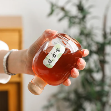 Wholesale 100ml 250ml 500ml Round Big Belly Transparent Custom Frosted Fruit Wine Glass Bottle with Cork Stopper