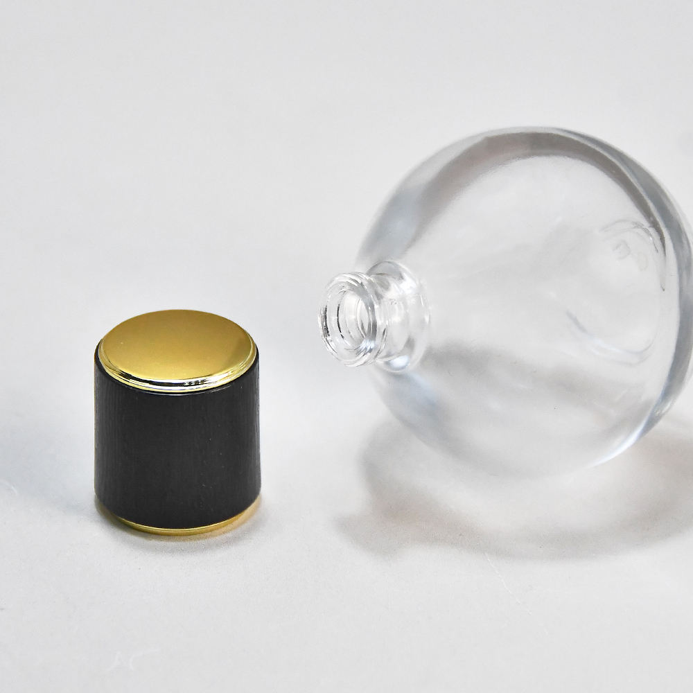 More Popular 30ml 50ml Sphere Transparent Empty Perfume Spray Bottle Glass with High Quality Black Plastic Lid