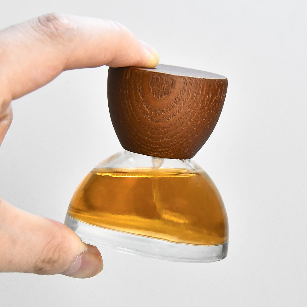 Introduction to High Quantity Empty Clear Unique Glass Spray 30ml Luxury Perfume Bottle with Wooden Lid Introduction to High Quantity Empty Clear Unique Glass Spray 30ml Luxury Perfume Bottle with Wooden Lid