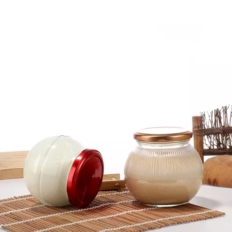New spherical beverage honey bird’s nest glass jar with metal lid directly supplied by the manufacturer