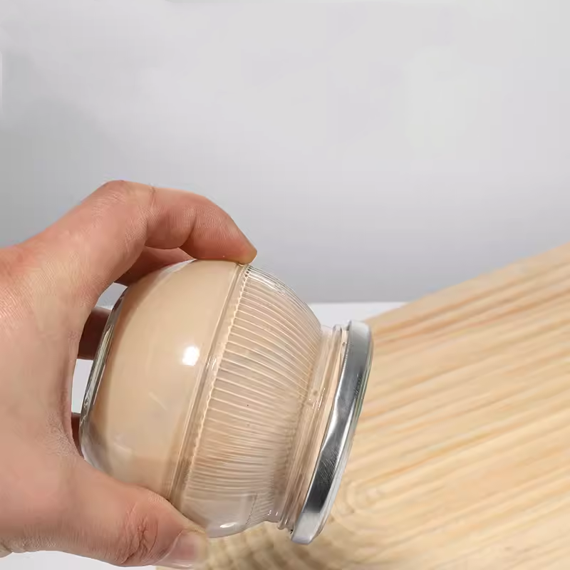 New spherical beverage honey bird’s nest glass jar with metal lid directly supplied by the manufacturer