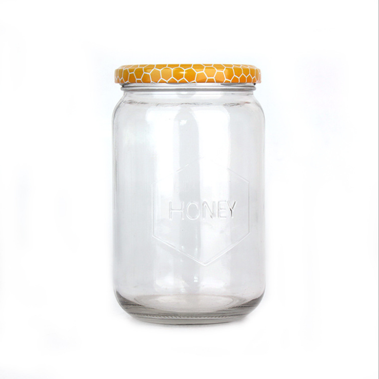 150ml 180ml 300ml 600ml 700ml Iraq Hot Sale Round Shape Bee Honey Glass Container Jar With Honeycomb Printed Lids