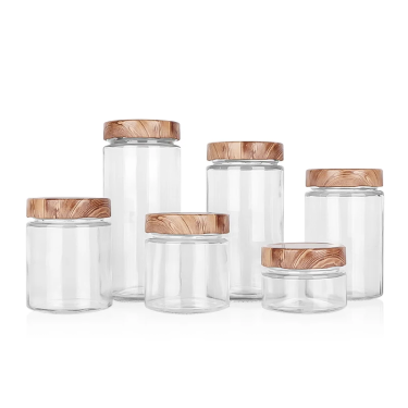 Wholesale Cylinder Simple Clear Airtight Glass Bottle Pickle Candy Dessert Nuts Glass Storage Jar with 58mm Cap
