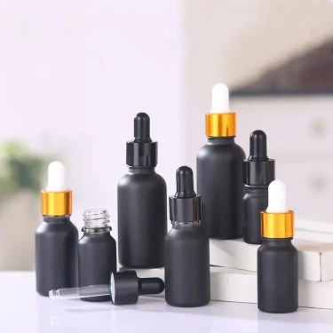 5ml – 100ml Custom black glass essential oil bottle wholesale cosmetics bottles with dropper lid empty
