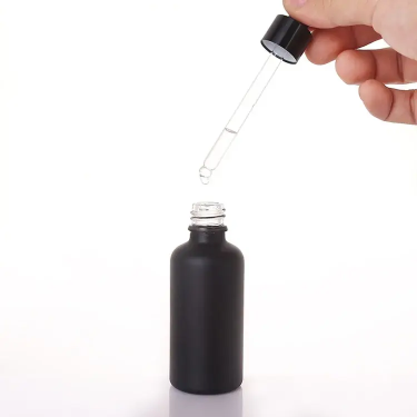 5ml - 100ml Custom black glass essential oil bottle wholesale cosmetics bottles with dropper lid empty