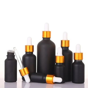 5ml – 100ml Custom black glass essential oil bottle wholesale cosmetics bottles with dropper lid empty