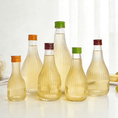 100ml 200ml 250ml 350ml 500ml 750ml transparent striped embossed small-mouth beverage glass bottles for juice wine with screw metal cap