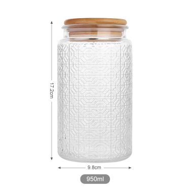 Wholesale embossed surface empty food grade glass storage jar with bamboo lid