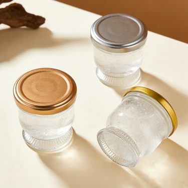 Wholesale lotus shape empty 60ml 85ml 130ml bird nest bottle glass jar with airtight lid