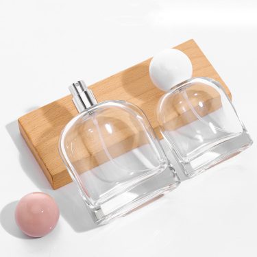 Empty 50ml 100ml high quality clear glass perfume bottle with lid wholesale
