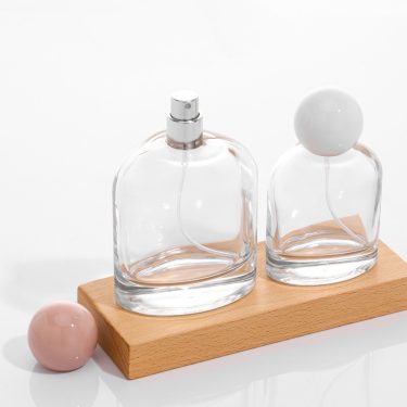 Empty 50ml 100ml high quality clear glass perfume bottle with lid wholesale