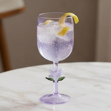 Artisan Hand Blown Purple Glass Goblet with Delicate White Flower Stem Base Elegant Tall Drinkware for Sophisticated Home Dining and Parties