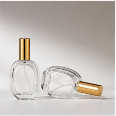 Luxury Oval Glass Perfume Bottle with Gold Cap Refillable Fragrance Packaging Bottle for Premium Perfume Cosmetic and Gift Collection