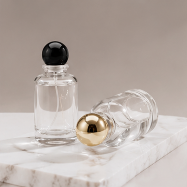 Luxury Clear Glass Perfume Bottle with Decorative Ball Cap Refillable Fragrance Cosmetic Packaging Bottle for Premium Perfume Collection